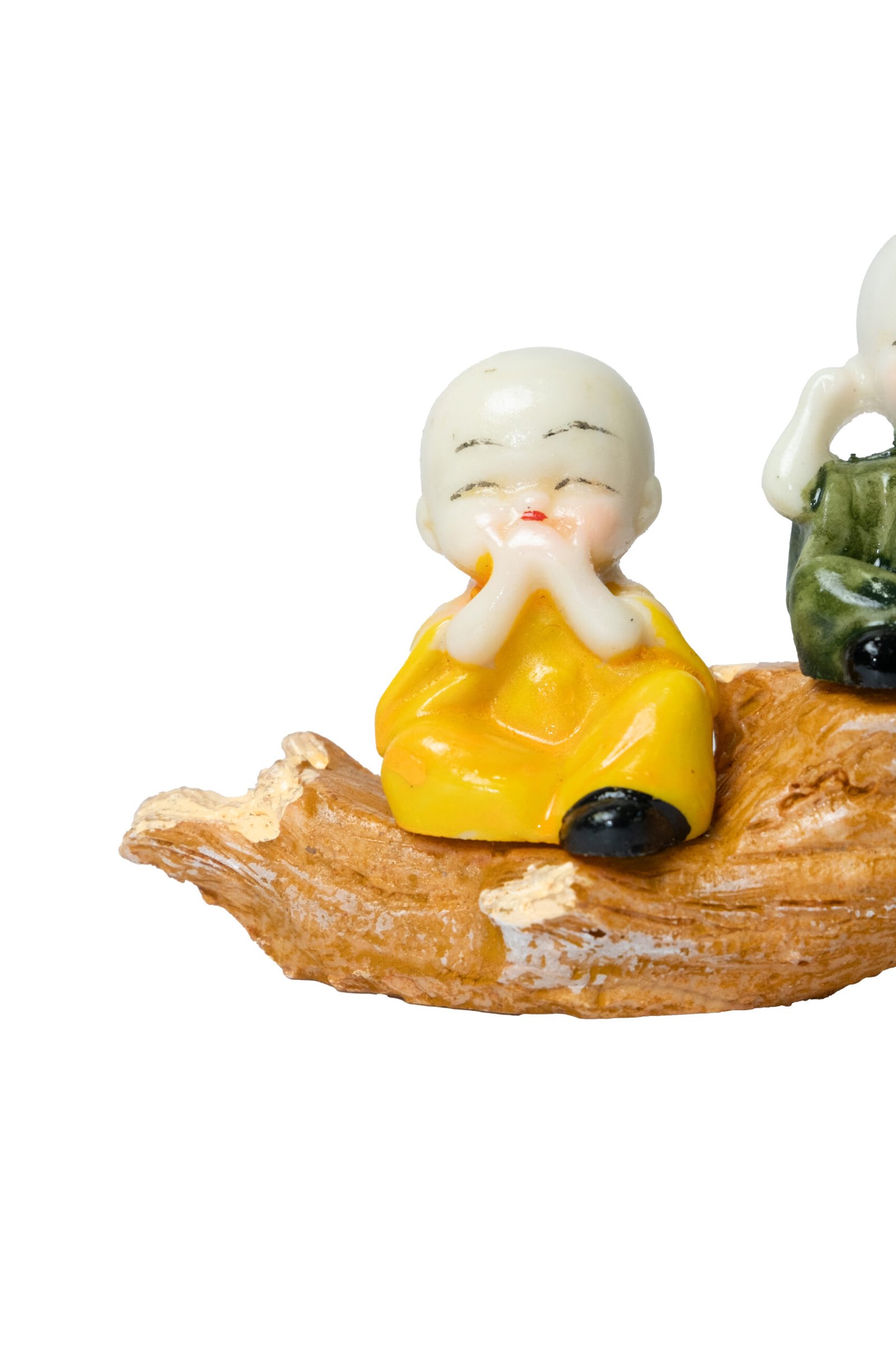 three baby buddha monks on wood branch colorful figurine set three baby buddha monks on wood branch colorful figurine set