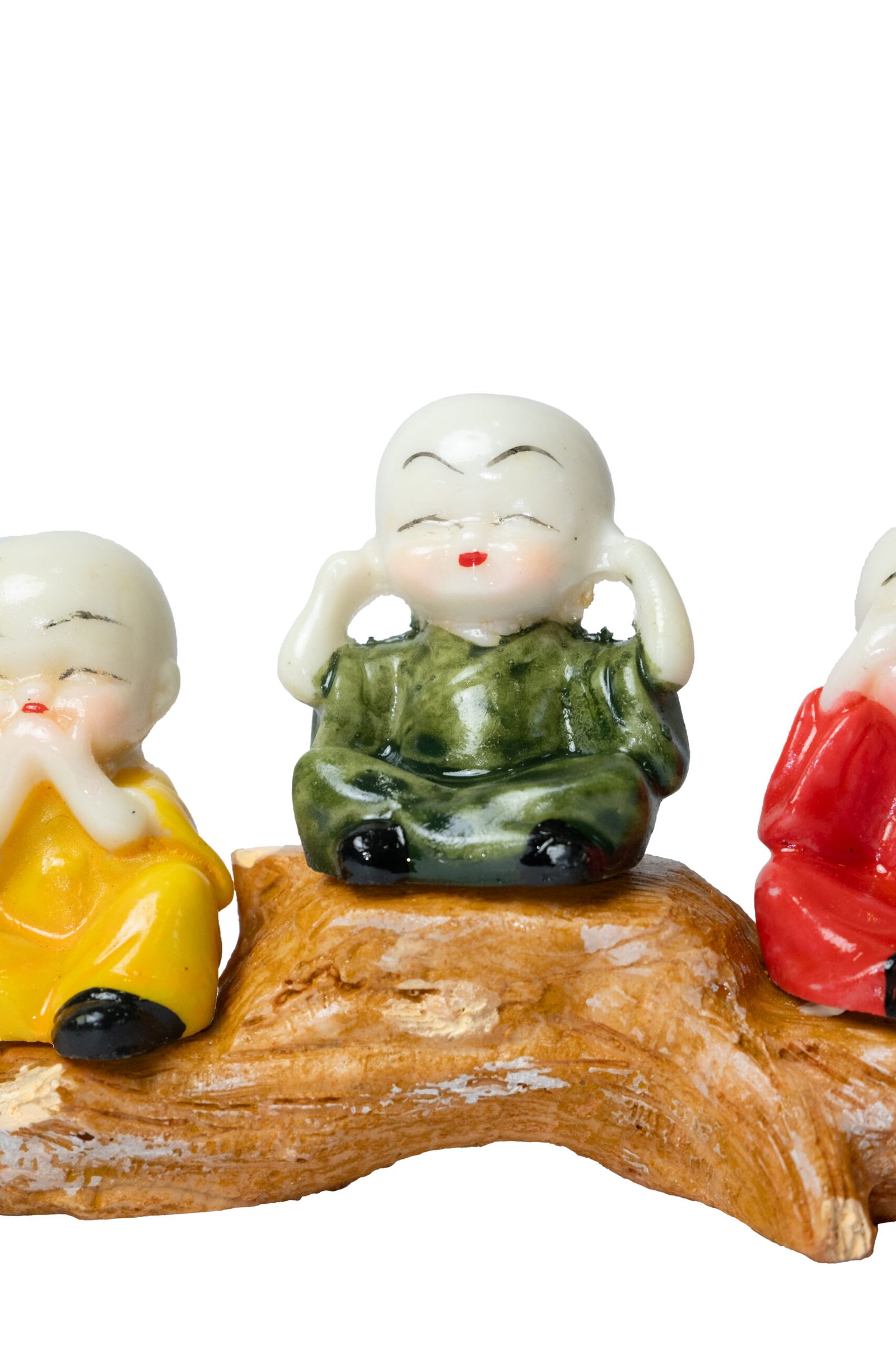 three baby buddha monks on wood branch colorful figurine set three baby buddha monks on wood branch colorful figurine set